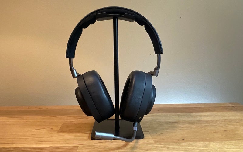 Master & Dynamic MG20 headphones on a stand